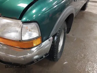 1999 Ford Ranger XL with VIN 1FTZR15V3XTA98120, listed as a IAAI auction lot 41955698 with 197,733 mi miles. Bid and sale history available at carsss.com. Image 6.