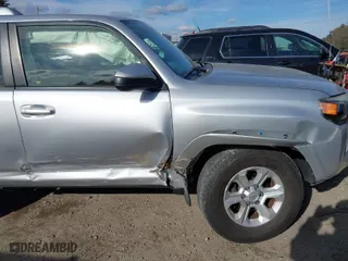 2016 Toyota 4Runner Limited with VIN JTEBU5JR1G5283914, listed as a IAAI auction lot 41340576 with 164,849 mi miles. Bid and sale history available at carsss.com. Image 6.