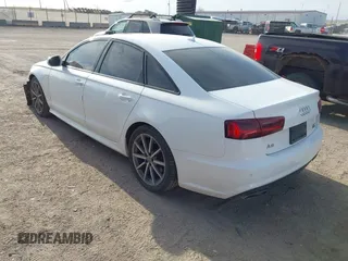 2017 Audi A6 Premium z VIN WAUF8AFC1HN100842, wystawiony jako IAAI lot #42024333 z przebiegiem 89 275 mil mil oraz . Historia ofert i sprzedaży dostępna na DreamBid. Obrazek 3.