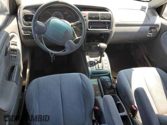 2002 Suzuki XL7 Standard z VIN JS3TX92V224107201, wystawiony jako Copart lot #61142394 z przebiegiem Nie podano mil oraz Szkoda całkowita • Salvage title. Historia ofert i sprzedaży dostępna na DreamBid. Obrazek 8.