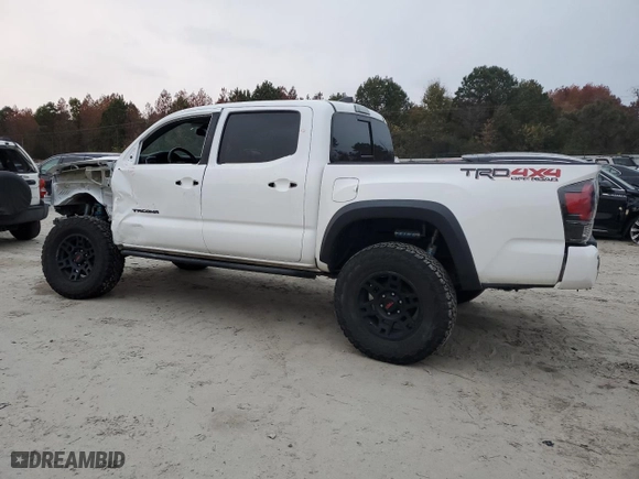2020 Toyota Tacoma 4WD SR5 with VIN 5TFCZ5AN1LX218079, listed as a Copart auction lot 80085974 with 65,634 mi miles and Salvage Title. Bid and sale history available at carsss.com. Image 2.