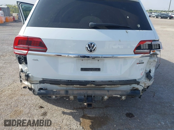 2019 Volkswagen Atlas SEL z VIN 1V2MR2CA8KC569640, wystawiony jako IAAI lot #42083995 z przebiegiem 127 104 mil mil oraz . Historia ofert i sprzedaży dostępna na DreamBid. Obrazek 6.