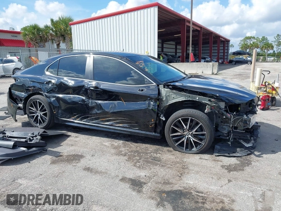 2023 Toyota Camry SE with VIN 4T1G11AK6PU741172, listed as a IAAI auction lot 41599909 with 56,668 mi miles and . Bid and sale history available at DreamBid. Image 18.