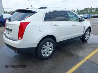 2011 Cadillac SRX Luxury Collection z VIN 3GYFNAEY2BS527043, wystawiony jako IAAI lot #42234641 z przebiegiem 114 769 mil mil oraz . Historia ofert i sprzedaży dostępna na DreamBid. Obrazek 4.