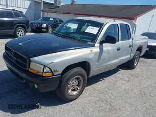 2000 Dodge Dakota Sport with VIN 1B7GL2AX6YS644891, listed as a IAAI auction lot 41961323 with 194,210 mi miles. Bid and sale history available at carsss.com. Image 2.