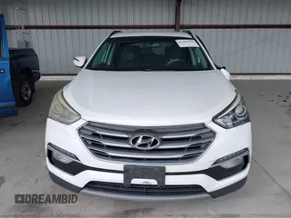 2018 Hyundai Santa Fe 2.4L z VIN 5NMZU3LB9JH083018, wystawiony jako IAAI lot #42205310 z przebiegiem 65 504 mil mil oraz . Historia ofert i sprzedaży dostępna na DreamBid. Obrazek 12.