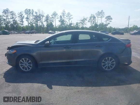 2017 Ford Fusion SE z VIN 3FA6P0H76HR259097, wystawiony jako IAAI lot #42133090 z przebiegiem 187 400 mil mil oraz . Historia ofert i sprzedaży dostępna na DreamBid. Obrazek 14.
