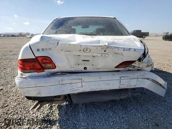 1999 Mercedes-Benz E-Class with VIN WDBJF65H6XA762532, listed as a Copart auction lot 79925364 with 196,487 mi miles and Salvage Title. Bid and sale history available at carsss.com. Image 6.