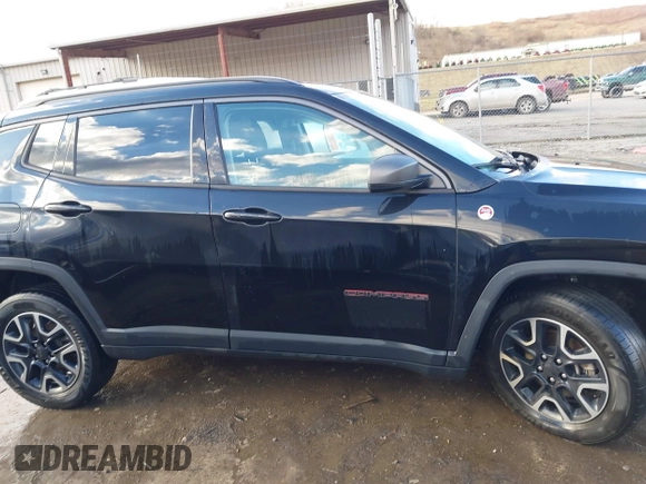 2019 Jeep Compass Trailhawk with VIN 3C4NJDDBXKT671364, listed as a IAAI auction lot 41655974 with 104,252 mi miles and . Bid and sale history available at carsss.com. Image 14.