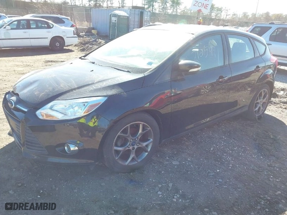 2013 Ford Focus SE with VIN 1FADP3K2XDL180319, listed as a IAAI auction lot 41697745 with 999,999 mi miles. Bid and sale history available at carsss.com. Image 2.