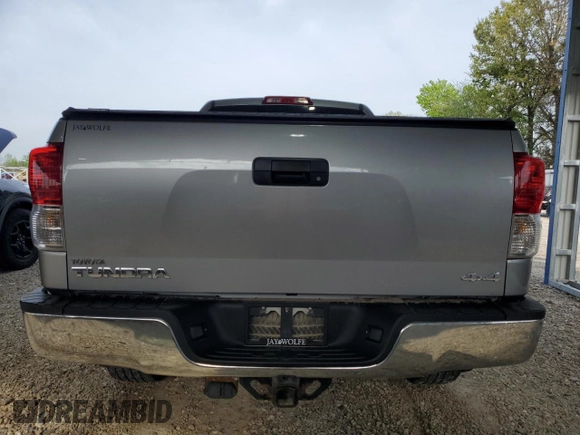 2012 Toyota Tundra z VIN 5TFUM5F1XCX039466, wystawiony jako Copart lot #53440515 z przebiegiem 246 012 mil mil oraz Szkoda całkowita • Salvage title. Historia ofert i sprzedaży dostępna na DreamBid. Obrazek 6.