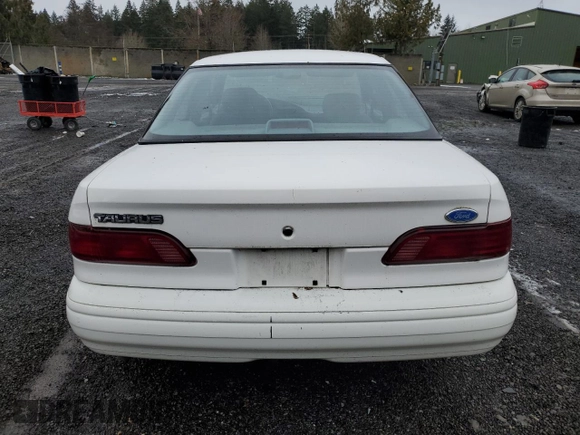 1994 Ford Taurus z VIN 1FALP5344RA291510, wystawiony jako Copart lot #43854925 z przebiegiem 69 067 mil mil oraz Tytuł czysty. Historia ofert i sprzedaży dostępna na DreamBid. Obrazek 6.