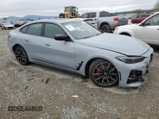 2023 BMW i4 M50 z VIN WBY33AW02PFP88948, wystawiony jako Copart lot #67563423 z przebiegiem 2 090 mil mil oraz . Historia ofert i sprzedaży dostępna na DreamBid. Obrazek 4.