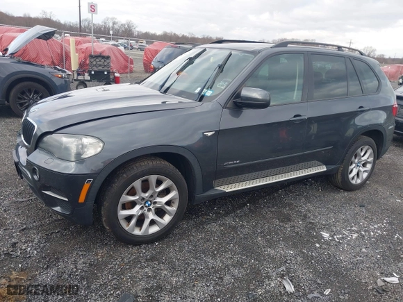 2011 BMW X5 35i with VIN 5UXZV4C59BL415034, listed as a IAAI auction lot 40969149 with 108,468 mi miles. Bid and sale history available at carsss.com. Image 2.