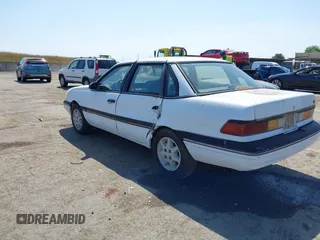 1988 Ford Tempo z VIN 1FAPP36X6JK132773, wystawiony jako IAAI lot #42146576 z przebiegiem 80 452 mil mil oraz . Historia ofert i sprzedaży dostępna na DreamBid. Obrazek 3.