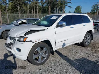 2015 Jeep Grand Cherokee Overland with VIN 1C4RJFCT6FC653386, listed as a IAAI auction lot 42084723 with 101,993 mi miles. Bid and sale history available at carsss.com. Image 2.