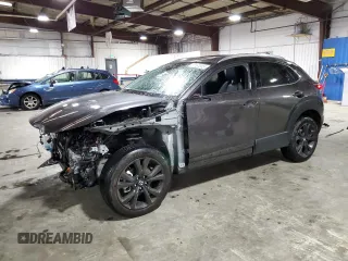 2021 Mazda CX-30 Premium with VIN 3MVDMBDY3MM310534, listed as a Copart auction lot 55134985 with 24,137 mi miles and Salvage title. Bid and sale history available at DreamBid. Image 1.