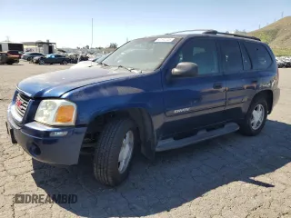 2002 GMC Envoy SLT with VIN 1GKDS13S322419275, listed as a Copart auction lot 52594445 with 220,623 mi miles and Clean Title. Bid and sale history available at carsss.com. Image 1.