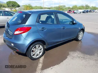 2014 Mazda 2 Sport with VIN JM1DE1KY0E0181555, listed as a IAAI auction lot 41539841 with 121,918 mi miles and . Bid and sale history available at DreamBid. Image 4.