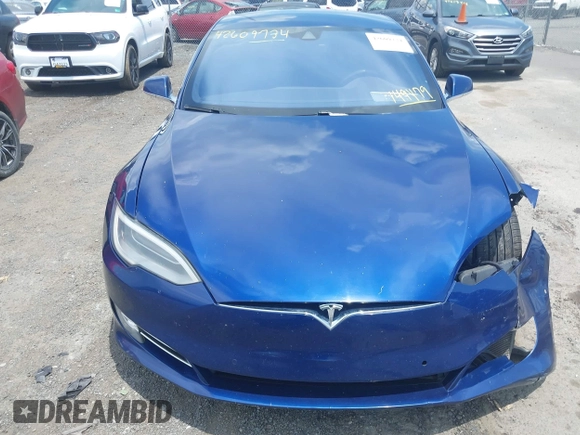 2016 Tesla Model S 70 with VIN 5YJSA1E17GF149479, listed as a IAAI auction lot 42609734 with 175,007 mi miles and . Bid and sale history available at DreamBid. Image 10.