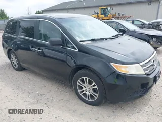 2012 Honda Odyssey EX-L with VIN 5FNRL5H60CB041996, listed as a IAAI auction lot 42628292 with 347,205 mi miles and . Bid and sale history available at DreamBid. Image 1.