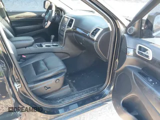 2012 Jeep Grand Cherokee Laredo with VIN 1C4RJFAG3CC246577, listed as a IAAI auction lot 41807693 with 164,574 mi miles. Bid and sale history available at carsss.com. Image 5.