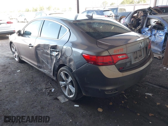 2014 Acura ILX Premium with VIN 19VDE1F51EE006621, listed as a IAAI auction lot 41984539 with 165,585 mi miles and . Bid and sale history available at DreamBid. Image 3.