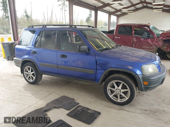 2001 Honda CR-V LX with VIN JHLRD28451C005857, listed as a IAAI auction lot 42004556 with 211,403 mi miles. Bid and sale history available at carsss.com. Image 13.