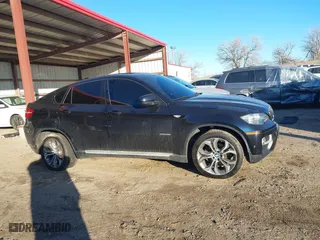 2014 BMW X6 xDrive35i with VIN 5UXFG2C59E0H11200, listed as a IAAI auction lot 41151158 with 140,478 mi miles. Bid and sale history available at carsss.com. Image 13.