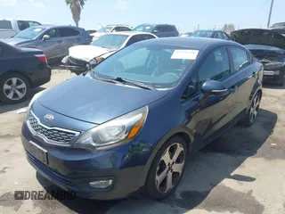 2013 Kia Rio EX with VIN KNADN4A34D6285224, listed as a IAAI auction lot 42790230 with 108,071 mi miles and . Bid and sale history available at DreamBid. Image 2.