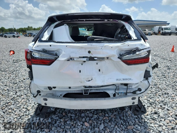 2018 Lexus RX 350L Premium с VIN JTJDZKCA2J2007817, выставлен на аукционе Copart как лот 61069725 с пробегом 74 461 миль миль и Списание • Salvage title. История ставок и продаж доступна на DreamBid. Изображение 6.