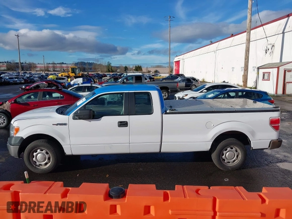 2014 Ford F-150 XL with VIN 1FTFX1CF4EKG53325, listed as a IAAI auction lot 41060015 with 216,554 mi miles. Bid and sale history available at carsss.com. Image 14.
