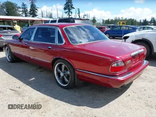 1998 Jaguar XJ Vanden Plas with VIN SAJKX6249WC844067, listed as a IAAI auction lot 42145235 with 117,142 mi miles and . Bid and sale history available at DreamBid. Image 3.