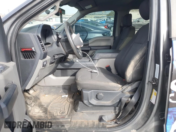 2019 Ford F-150 XL with VIN 1FTEW1CP3KKD68005, listed as a Copart auction lot 50599475 with 129,200 mi miles and Salvage Title. Bid and sale history available at carsss.com. Image 7.