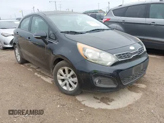 2013 Kia Rio SX with VIN KNADN5A36D6245572, listed as a IAAI auction lot 42182188 with 205,142 mi miles and . Bid and sale history available at DreamBid. Image 1.