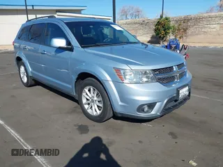2013 Dodge Journey SXT with VIN 3C4PDCBG5DT674863, listed as a IAAI auction lot 41670225 with 207,524 mi miles. Bid and sale history available at carsss.com. Image 1.
