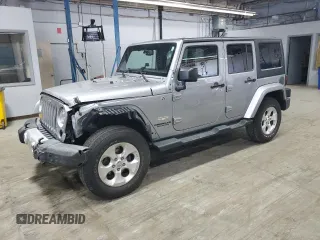2015 Jeep Wrangler Unlimited Sahara z VIN 1C4BJWEG5FL743663, wystawiony jako Copart lot #60205225 z przebiegiem 69 922 mil mil oraz Szkoda całkowita • Salvage title. Historia ofert i sprzedaży dostępna na DreamBid. Obrazek 1.