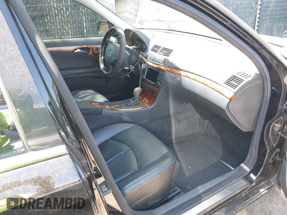 2005 Mercedes-Benz E-Class 3.2L with VIN WDBUF65J15A649830, listed as a IAAI auction lot 42062140 with 170,633 mi miles. Bid and sale history available at carsss.com. Image 5.