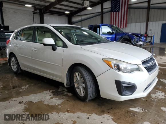2012 Subaru Impreza Premium with VIN JF1GPAC6XCH246534, listed as a Copart auction lot 61001935 with 141,728 mi miles and Salvage title. Bid and sale history available at DreamBid. Image 4.