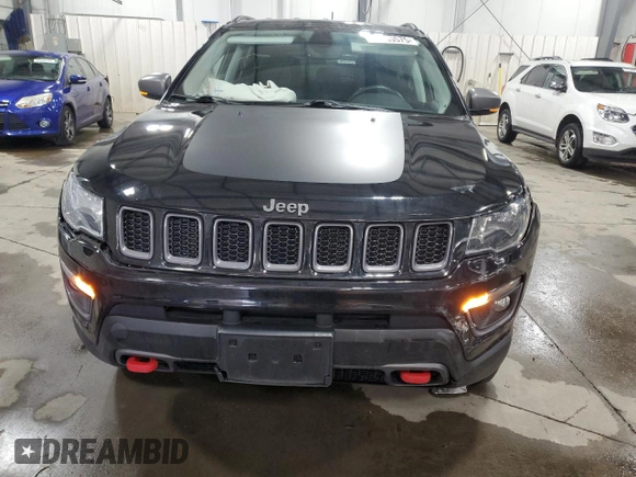 2019 Jeep Compass Trailhawk with VIN 3C4NJDDB4KT647187, listed as a Copart auction lot 50260575 with 63,098 mi miles and Salvage Title. Bid and sale history available at carsss.com. Image 5.