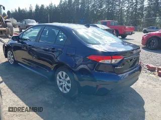 2023 Toyota Corolla LE with VIN 5YFB4MDE2PP052532, listed as a IAAI auction lot 42169698 with 32,622 mi miles. Bid and sale history available at carsss.com. Image 3.
