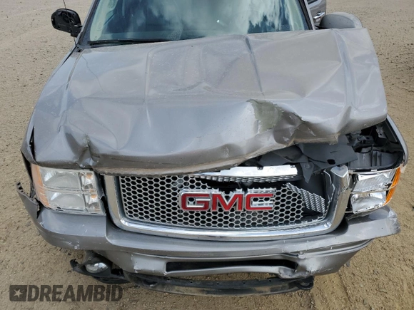 2013 GMC Sierra 1500 Denali z VIN 3GTP2XE26DG348754, wystawiony jako Copart lot #49663215 z przebiegiem 122 195 mil mil oraz Szkoda całkowita • Salvage title. Historia ofert i sprzedaży dostępna na DreamBid. Obrazek 11.