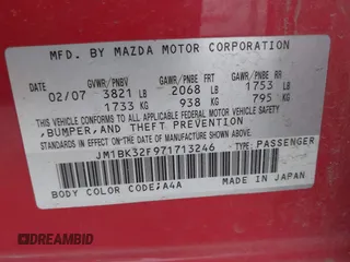 2007 Mazda 3 i Sport with VIN JM1BK32F971713246, listed as a IAAI auction lot 41905237 with 153,896 mi miles. Bid and sale history available at carsss.com. Image 9.