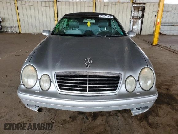 2000 Mercedes-Benz CLK 320/430 z VIN WDBLK70G3YT033094, wystawiony jako Copart lot #49511445 z przebiegiem 193 281 mil mil oraz Szkoda całkowita • Salvage title. Historia ofert i sprzedaży dostępna na DreamBid. Obrazek 5.