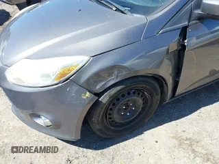 2012 Ford Focus SE with VIN 1FAHP3F2XCL433827, listed as a IAAI auction lot 41843960 with 156,343 mi miles. Bid and sale history available at carsss.com. Image 6.