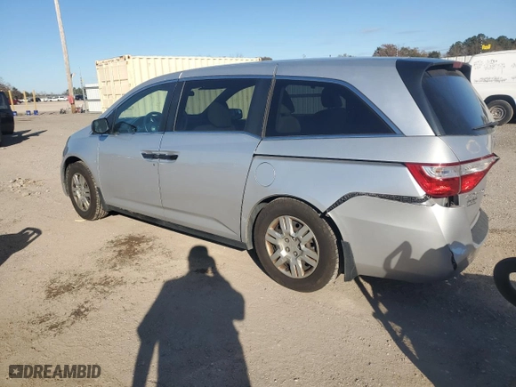 2011 Honda Odyssey LX with VIN 5FNRL5H26BB010599, listed as a Copart auction lot 85922514 with 148,401 mi miles and Salvage Title. Bid and sale history available at carsss.com. Image 2.