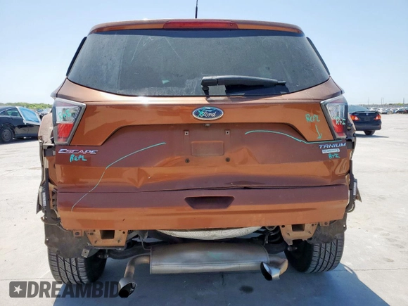 2017 Ford Escape Titanium with VIN 1FMCU0JD3HUA31410, listed as a Copart auction lot 52729025 with 68,256 mi miles and Salvage Title. Bid and sale history available at DreamBid. Image 6.