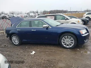 2013 Chrysler 300 Luxury Series with VIN 2C3CCASGXDH564717, listed as a IAAI auction lot 41716331 with 133,220 mi miles. Bid and sale history available at carsss.com. Image 13.