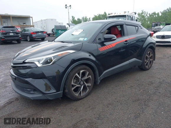 2018 Toyota C-HR XLE with VIN JTNKHMBX6J1000904, listed as a IAAI auction lot 42513117 with 77,192 mi miles and . Bid and sale history available at DreamBid. Image 2.