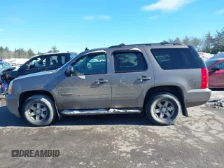 2013 GMC Yukon SLE with VIN 1GKS2AE03DR354179, listed as a IAAI auction lot 41612114 with 150,851 mi miles. Bid and sale history available at carsss.com. Image 14.